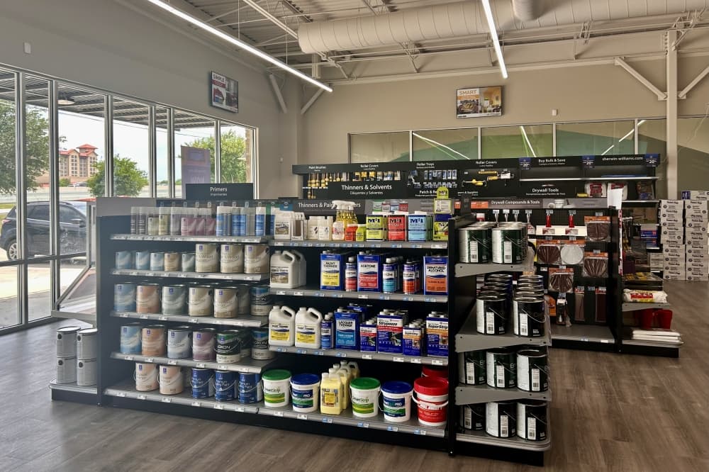 A shot of a aisle that has paint products