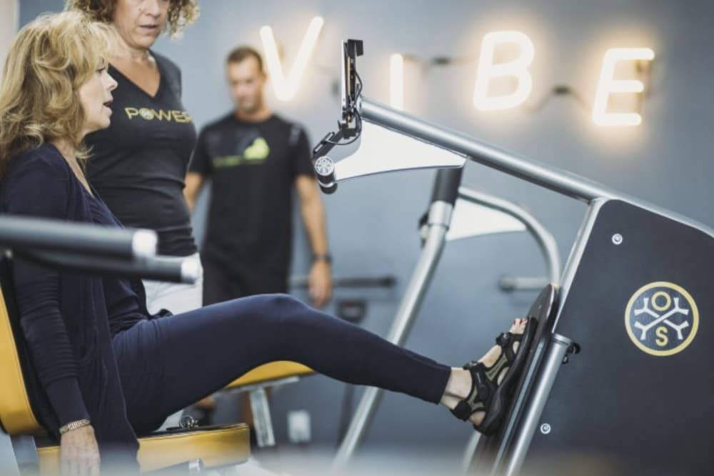 An image of a person using a machine at the business. 