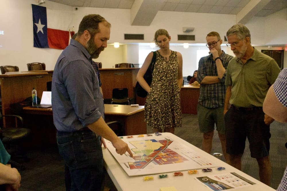 Antero Group Project Manager Sean Norton talks to residents about potential areas for rezoning. (Aubrey Vogel/Community Impact)