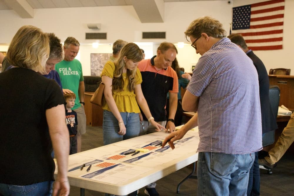 Jersey Village residents participate in an interactive activity looking at objectives for the city's comprehensive plan update. (Aubrey Vogel/Community Impact)