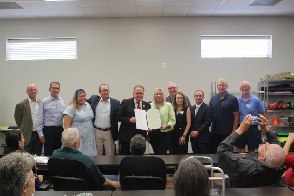 group of people with a proclamation