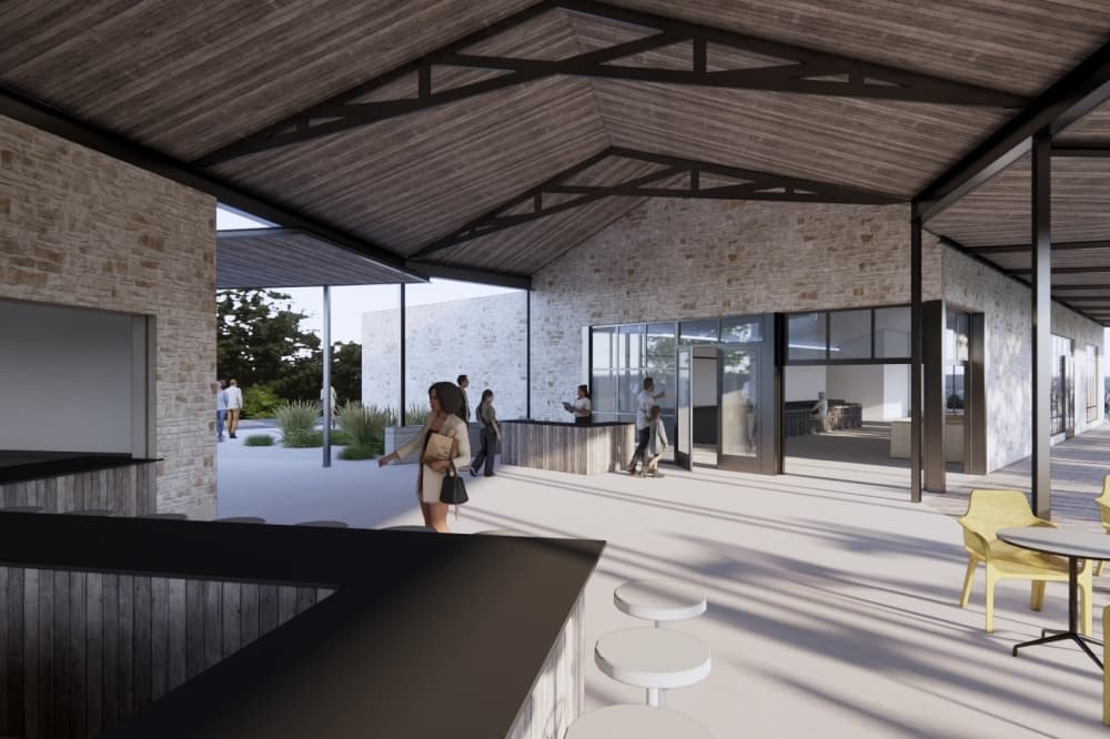 People walking around at a rendering of The Roundabout
