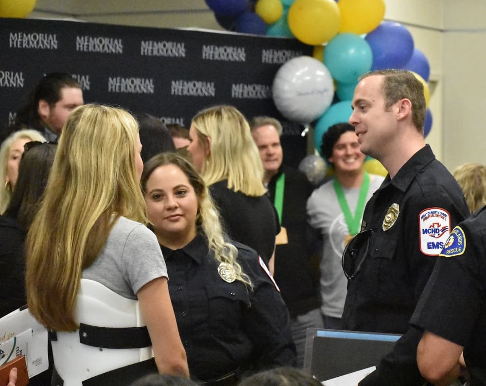 group of EMTs talking