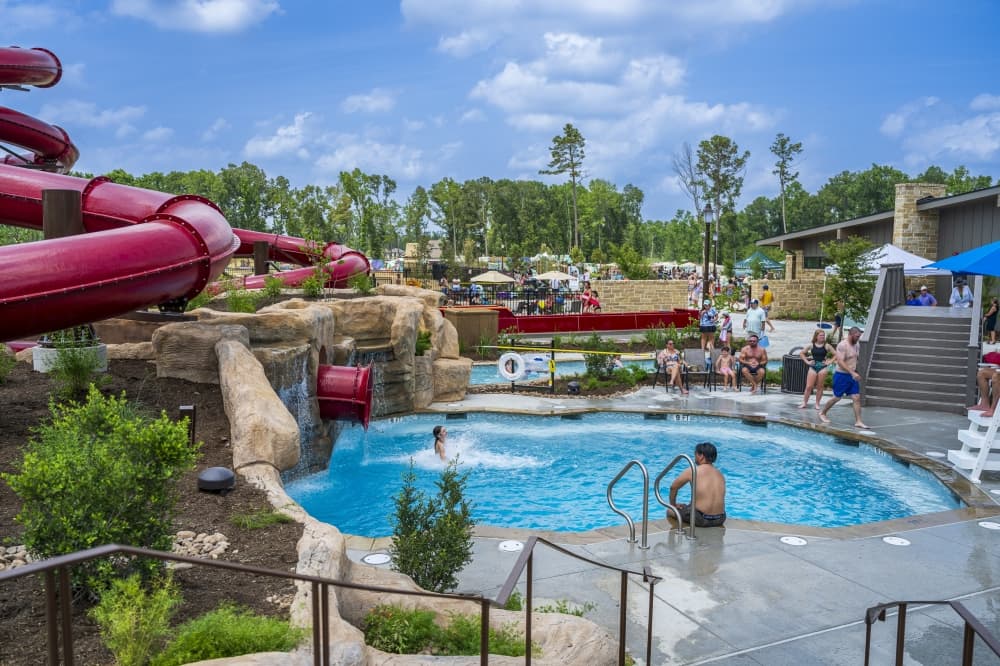 The Highlands by Caldwell Communities opens Phase 1 of Discovery Cove with water park and amenities. 