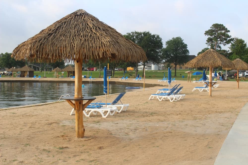 The Lake Conroe Beach Park features a sandy beach area along Lake Conroe. (Jessica Shorten/Community Impact)