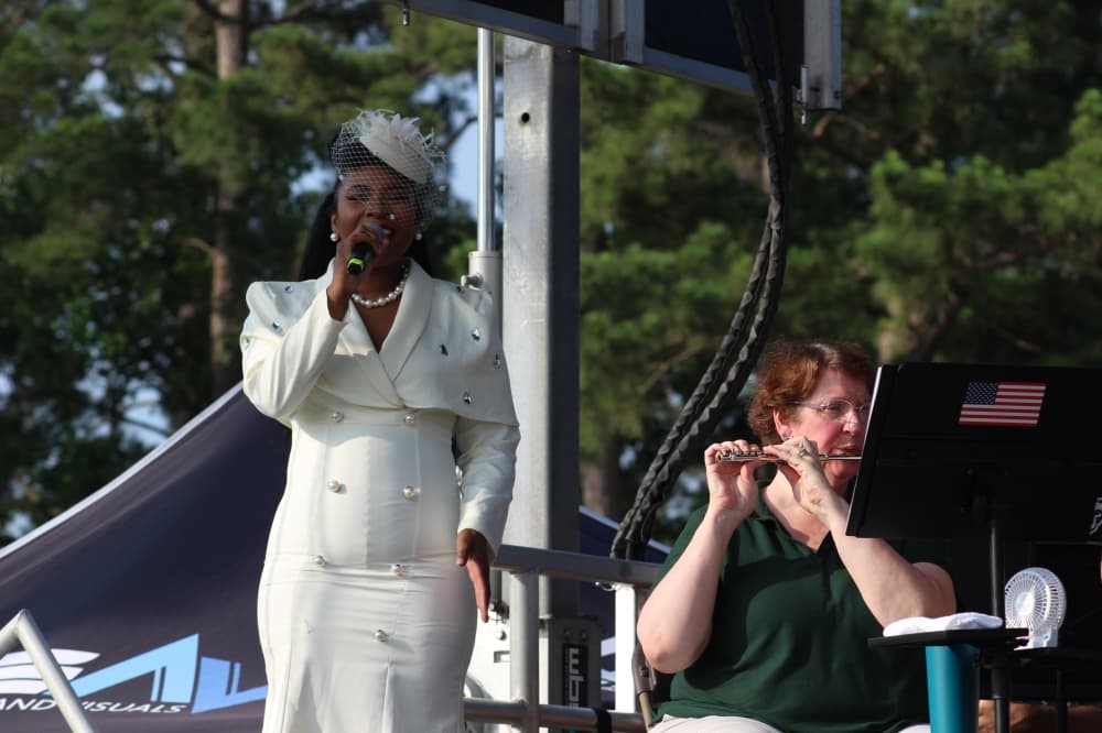 Tati Dior performed the national anthem alongside the White Oak Wind Orchestra on May 24. (Jessica Shorten/Community Impact)