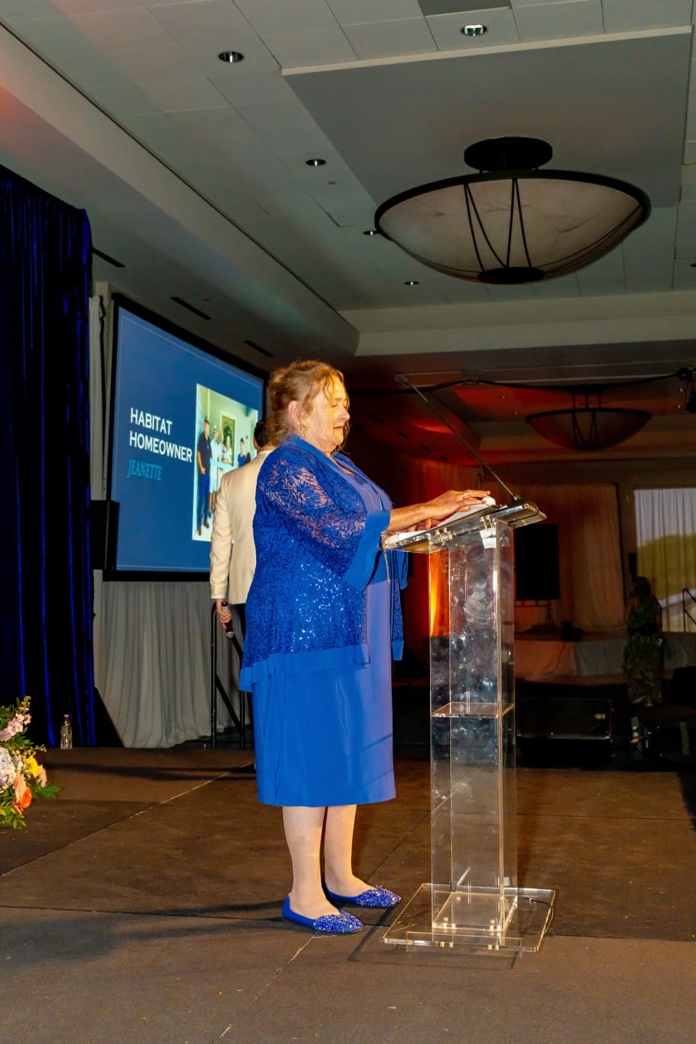speaker at a podium