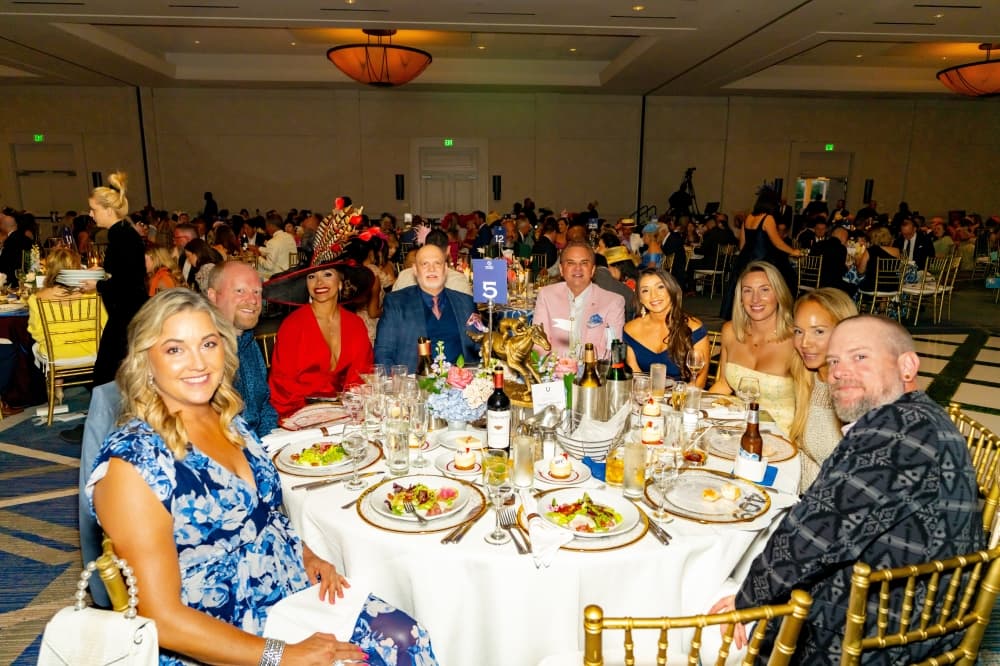 people seated at gala table