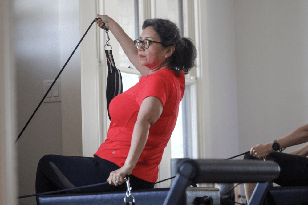 Reformer Pilates is practiced using balance body reformers. (Amira Van Leeuwen/ Community Impact)