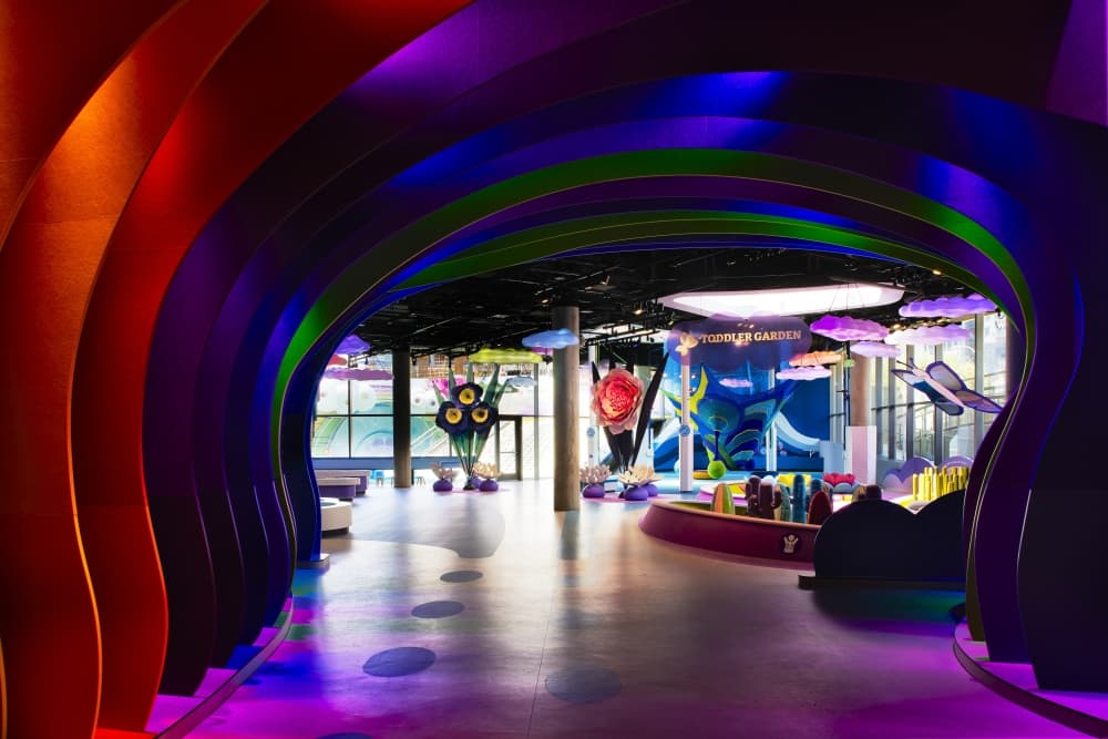 Dramatically lit entrances to a children's museum. 