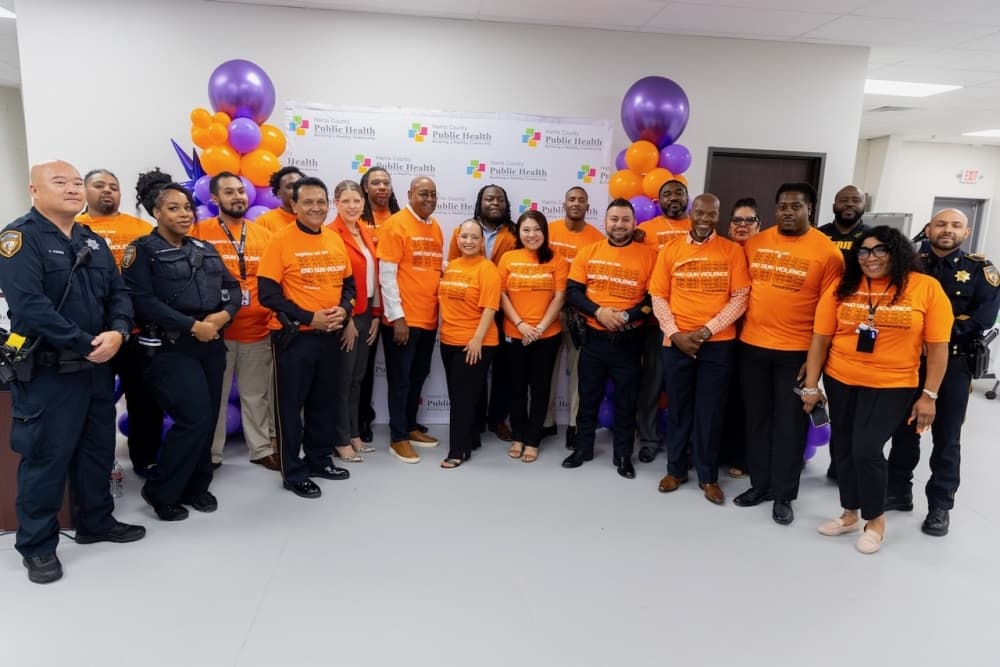 A photo of Harris County officials at the RISE center