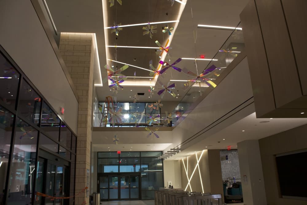 The lobby of the new medical center features art hanging from the ceiling. (Samantha Douty/Community Impact)