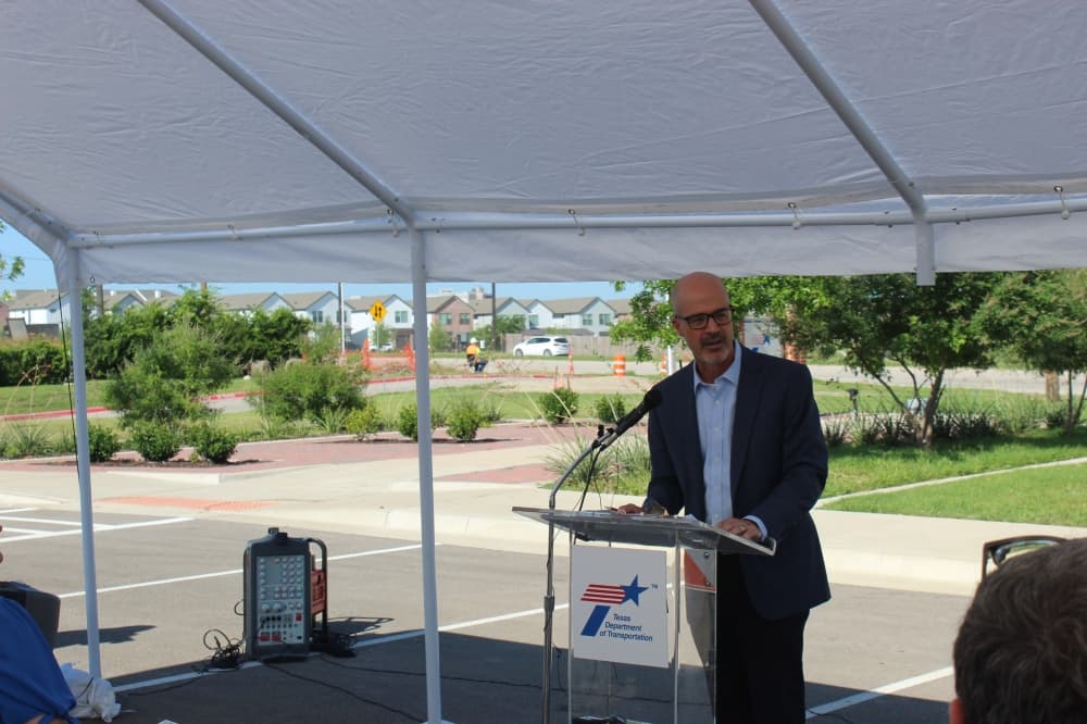 Marc Williams, executive director of the Texas Department of Transportation, speaks during a groundbreaking ceremony for the Spur 399 expansion project held June 17 in McKinney.
