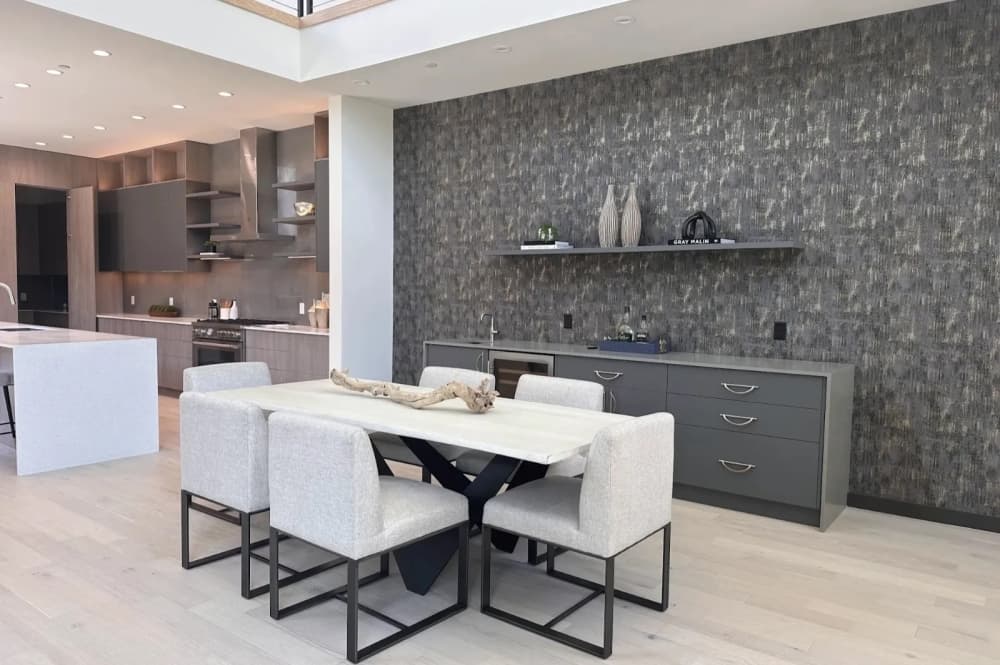 A dining room in a townhome with display furniture
