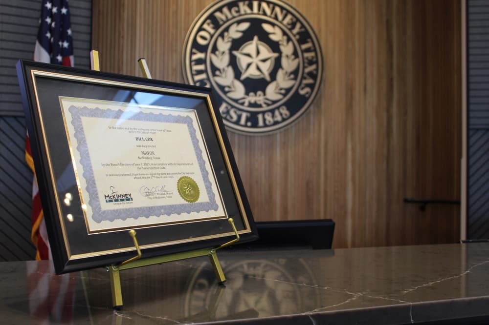 A certificate commemorating Mayor Bill Cox's election to McKinney City Council.
