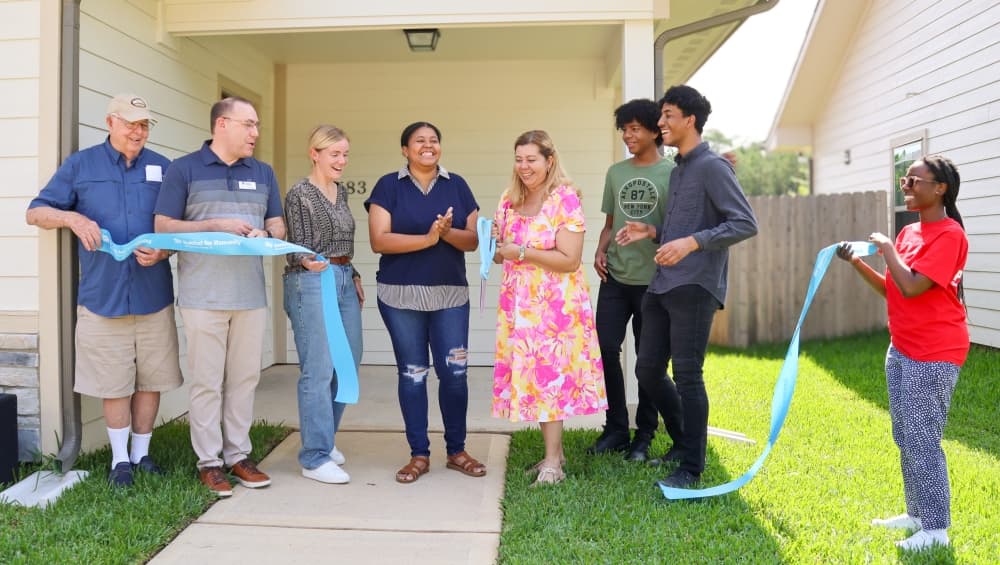 To qualify for a Habitat home, applicants must meet three requirements: a need for better housing, the ability to pay a mortgage, and a willingness to partner with Habitat. The need for better housing is determined by the living situation of applicants. (Courtesy Habitat for Humanity Montgomery County)