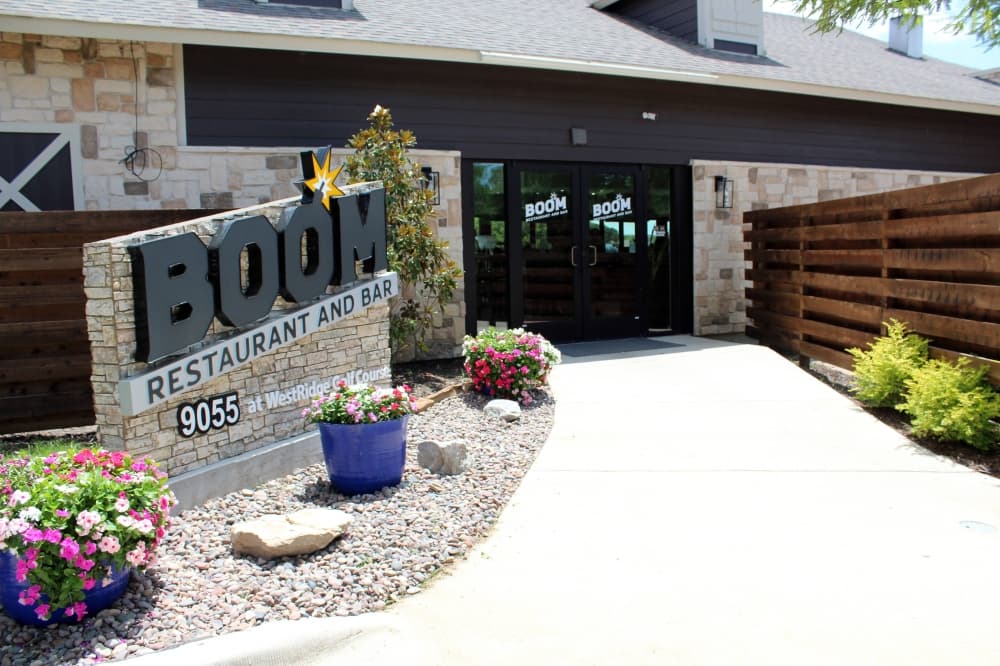 Entrance to a restaurant and bar named Boom. 