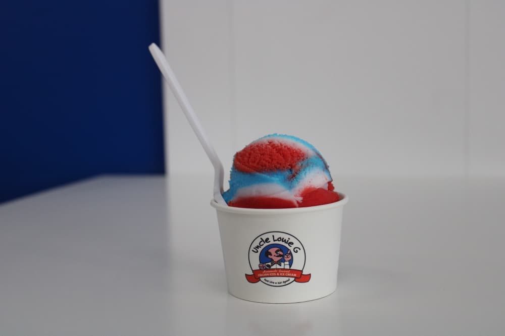 Cup filled with red, white and blue sorbet. 