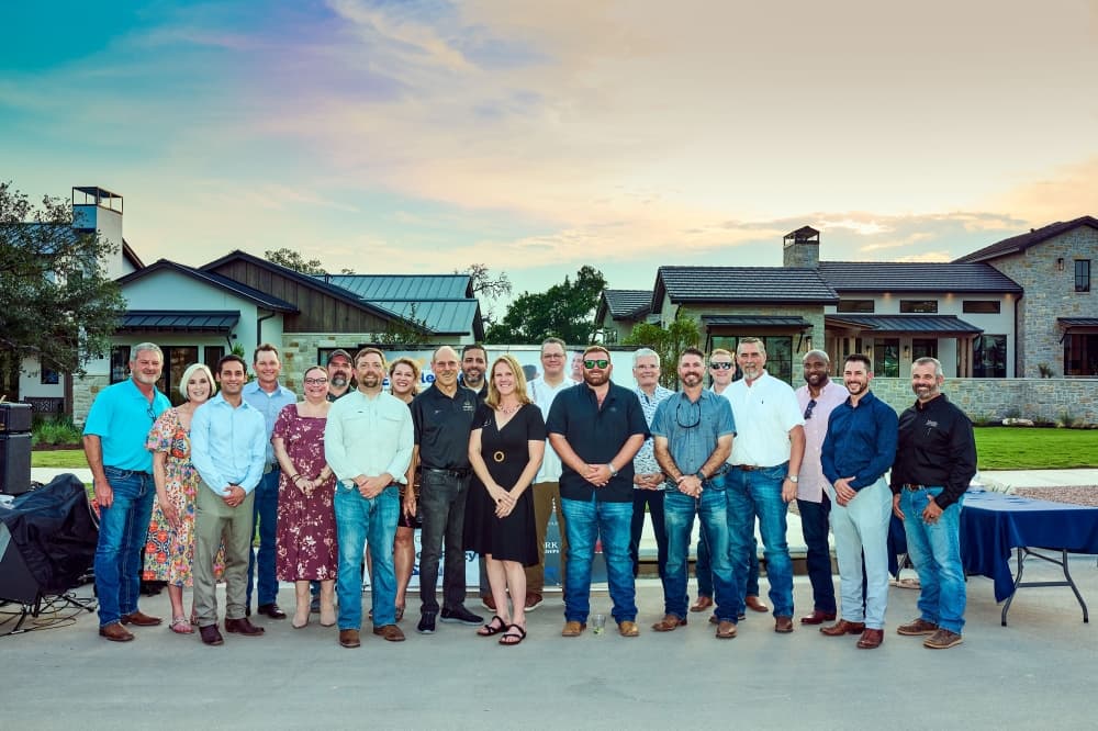 Realtors help potential homeowners find a luxurious and comforting home in Boerne in George's Ranch at the grand opening. 