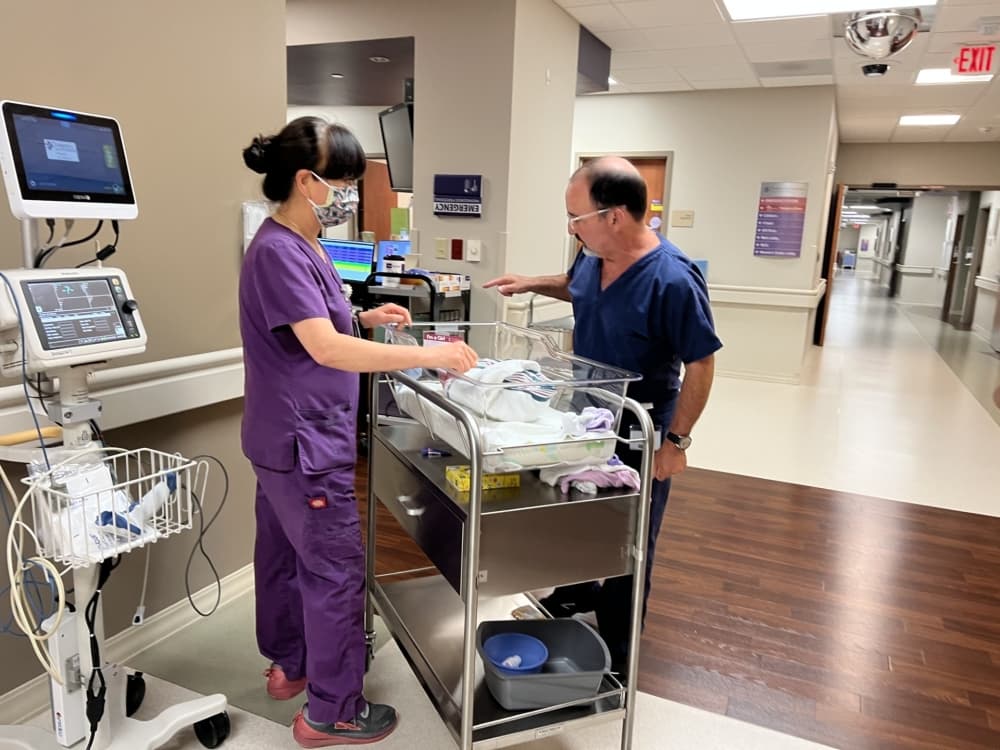 Medical professionals at CHRISTUS Health take care of newborn baby and the mother as part of pre- and post-natal women's health care. 