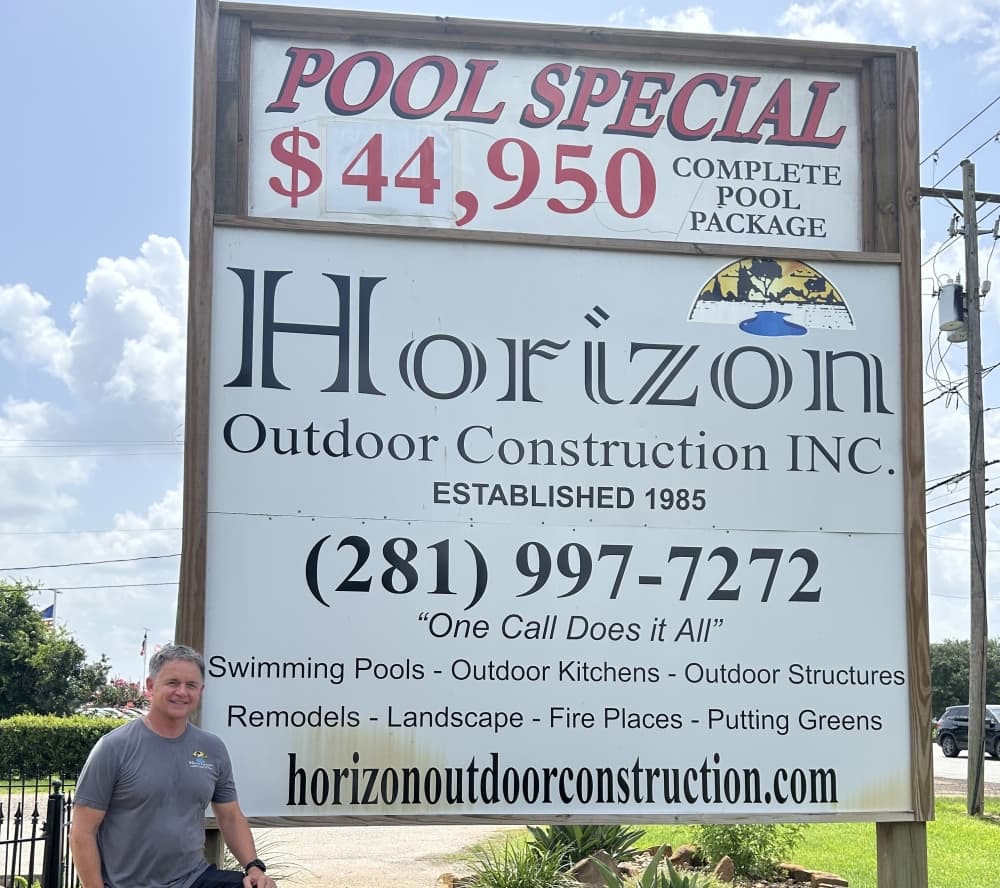 Owner and founder Curt Olmstead stands in front of the Horizon Outdoor Construction sign. The company was founded in 1985 in Pearland. 