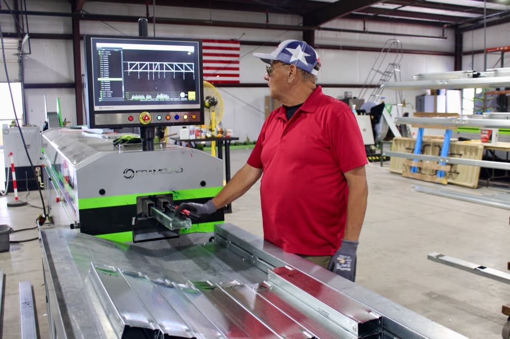 The steel panels being printed and shaped