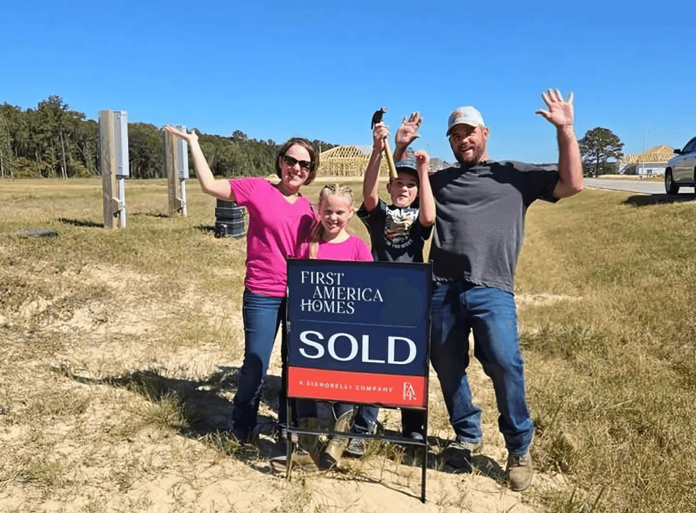 Happy family celebrating new home purchase with the help and guidance of First America Homes. 