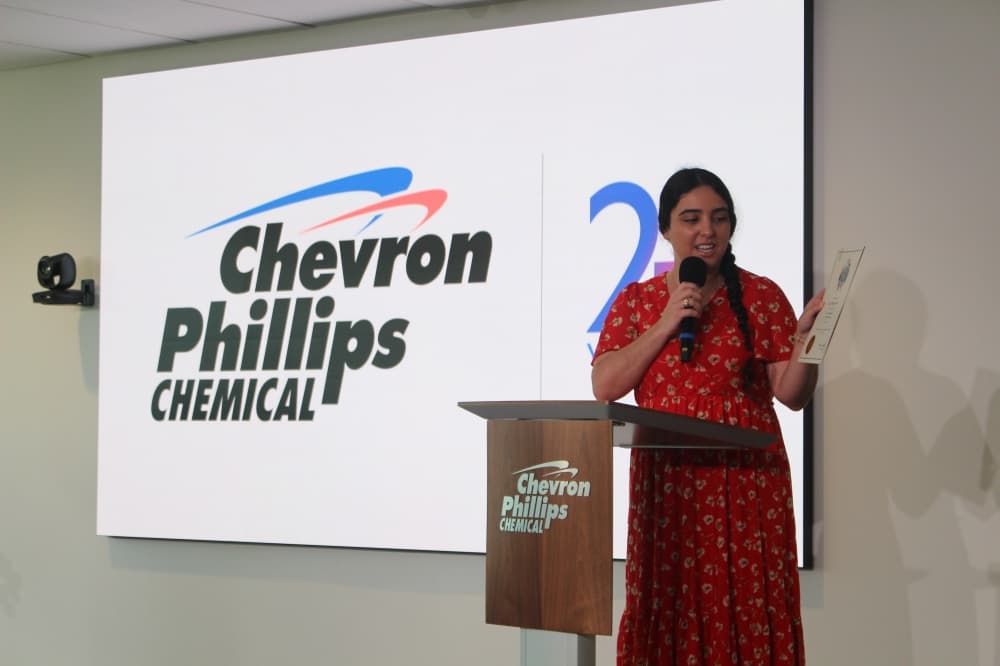 Shiva Baradaran speaks at a podium