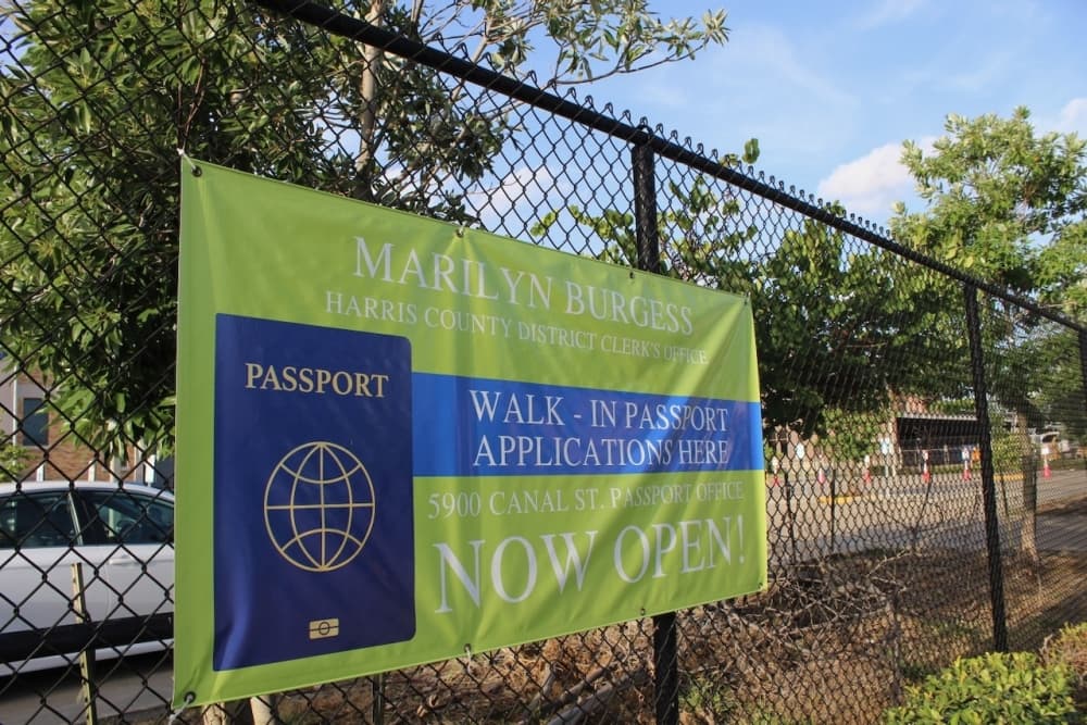 A photo of official signage outside a new county building. 