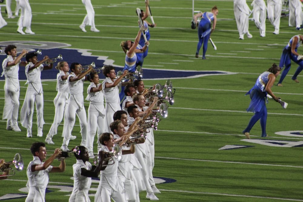 The Phantom Regiment Drum and Bugle Corps perform during the DCI McKinney event held July 21 at McKinney ISD Stadium. 