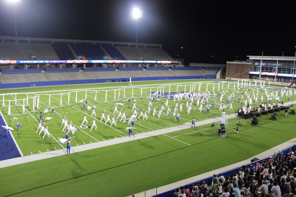 The Phantom Regiment Drum and Bugle Corps perform during the DCI McKinney event held July 21 at McKinney ISD Stadium.