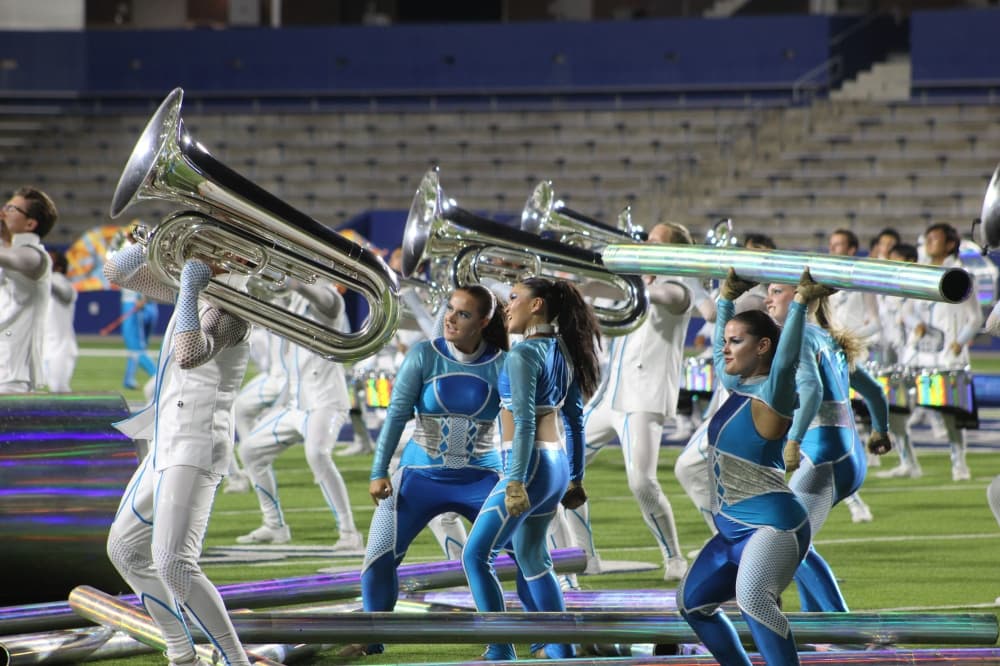 Members of the Mandarins Drum and Bugle Corps perform during the DCI McKinney event held July 21 at McKinney ISD Stadium.
