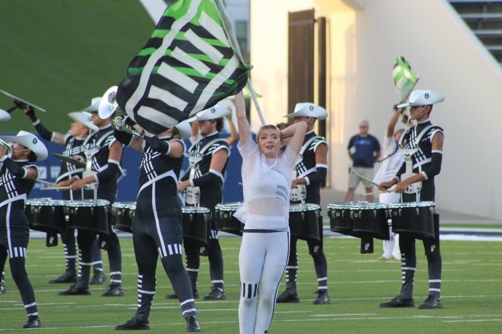 Members of the Crossmen Drum and Bugle Corps perform during the DCI McKinney event held July 21 at McKinney ISD Stadium.