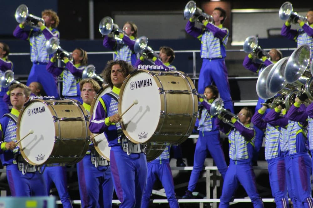 Members of the Blue Stars Drum and Bugle Corps perform during the DCI McKinney event held July 21 at McKinney ISD Stadium.