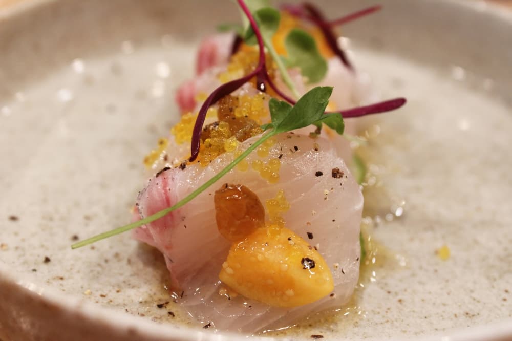 Sushi on a dish.