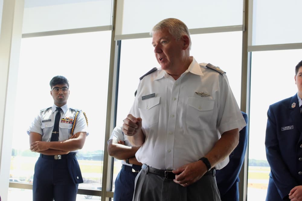 Check Pilot Kurtis Sampson (center) speaks about the Civil Air Patrol during a news conference held July 23 at McKinney National Airport.