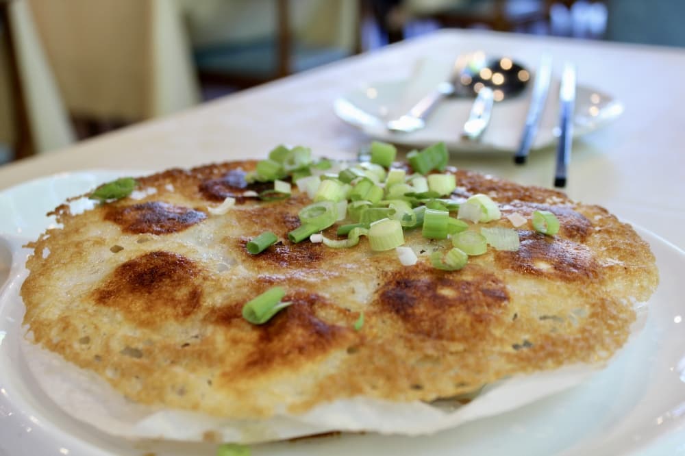 Mimi Garden serves pan fried kurobuta pork dumplings ($14.50). (Jovanna Aguilar/Community Impact)