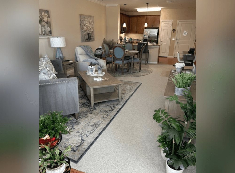 Spacious independent living apartment in Conroe’s Woodhaven Village, featuring modern appliances and maintenance-free senior living.