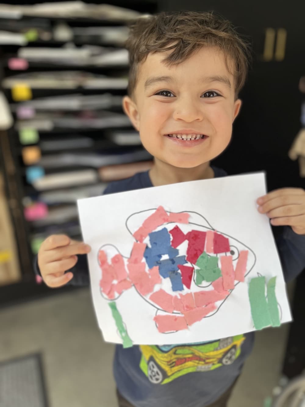 a kid holding art