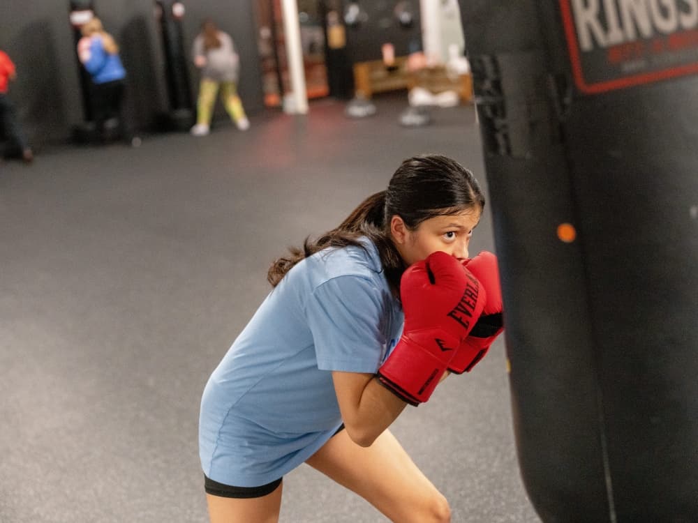 An image of a student boxing. 