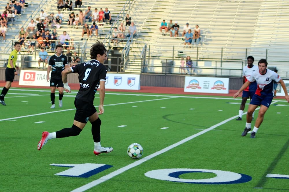McKinney Chupacabras FC player kicking a ball