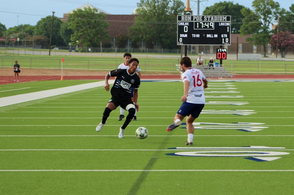 McKinney Chupacabras FC player kicking a ball