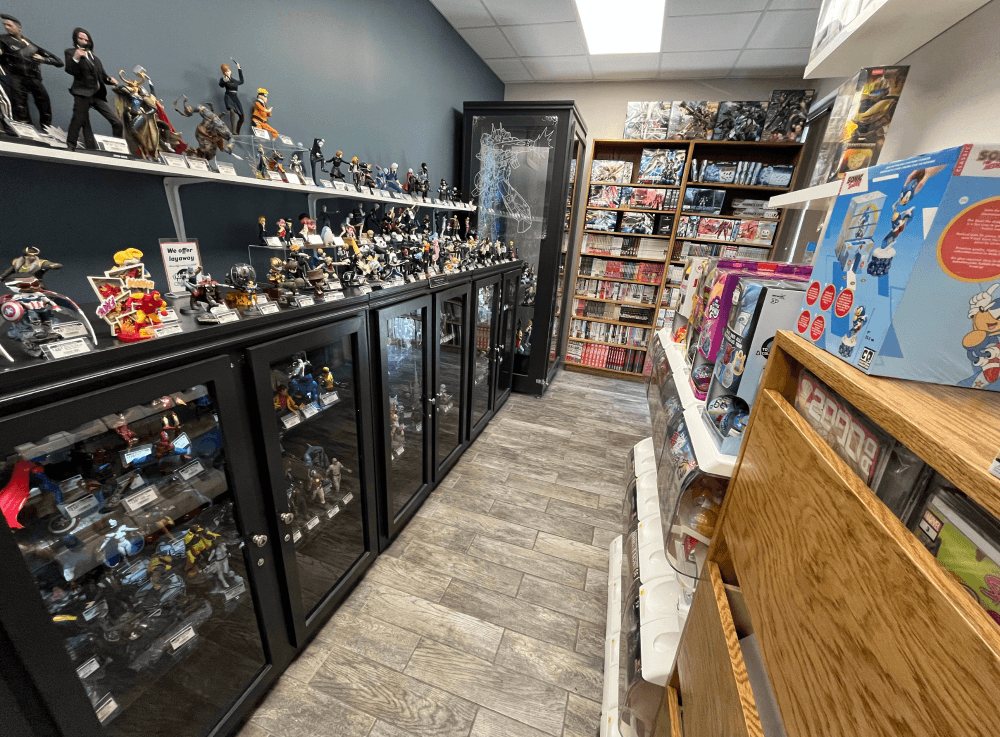 Adventure Stadium upstairs at The Adventure Begins showcasing rare sports memorabilia and trading card displays.