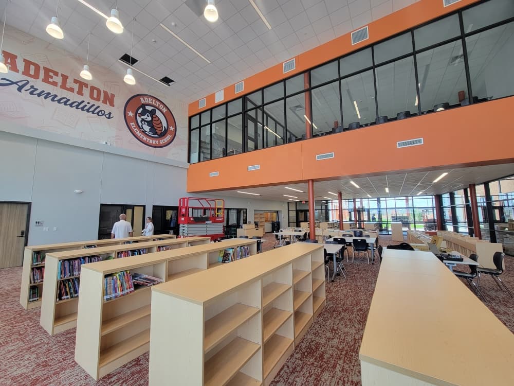 Large windows provide natural light in the library space. (Courtesy Bastrop ISD)