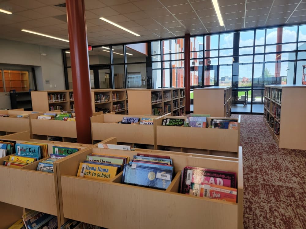 A variety of shelving types keeps books available to readers of all ages. (Courtesy Bastrop ISD)