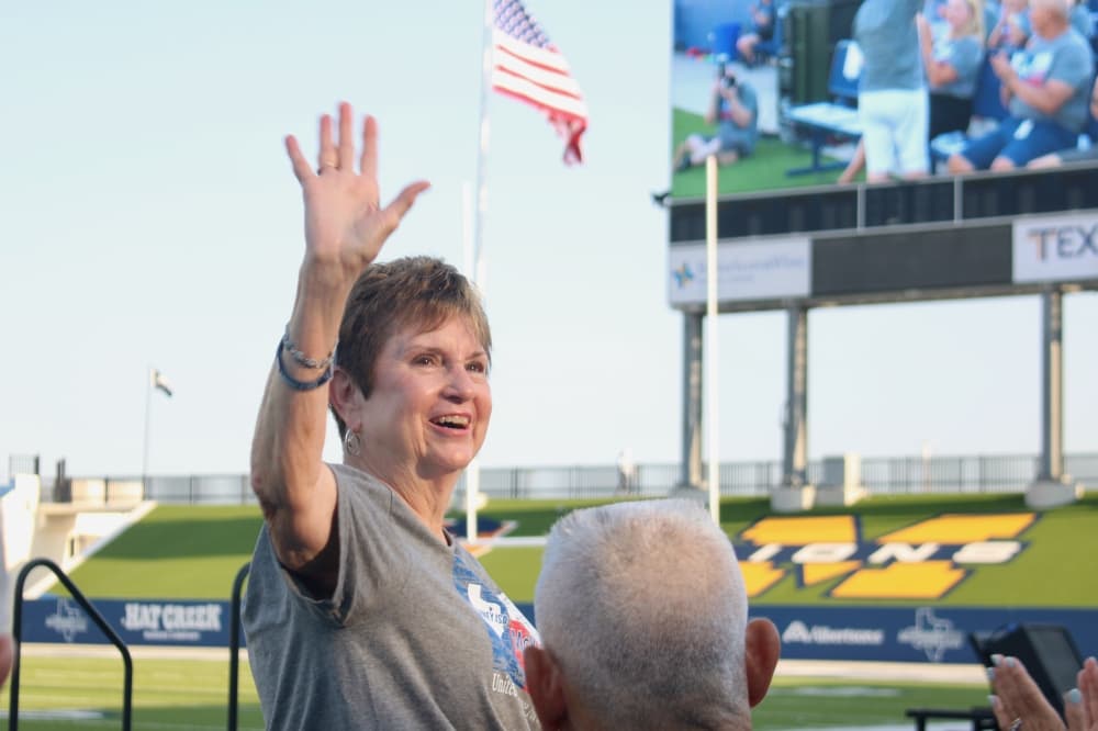 Lynn Sperry waving