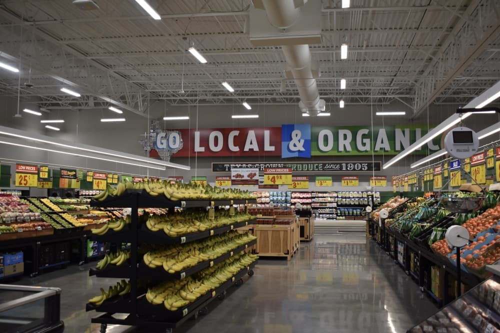 a large produce section at a grocery store