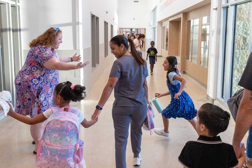 Teachers welcome students and their parents to the new campus. (Courtesy Hutto ISD)