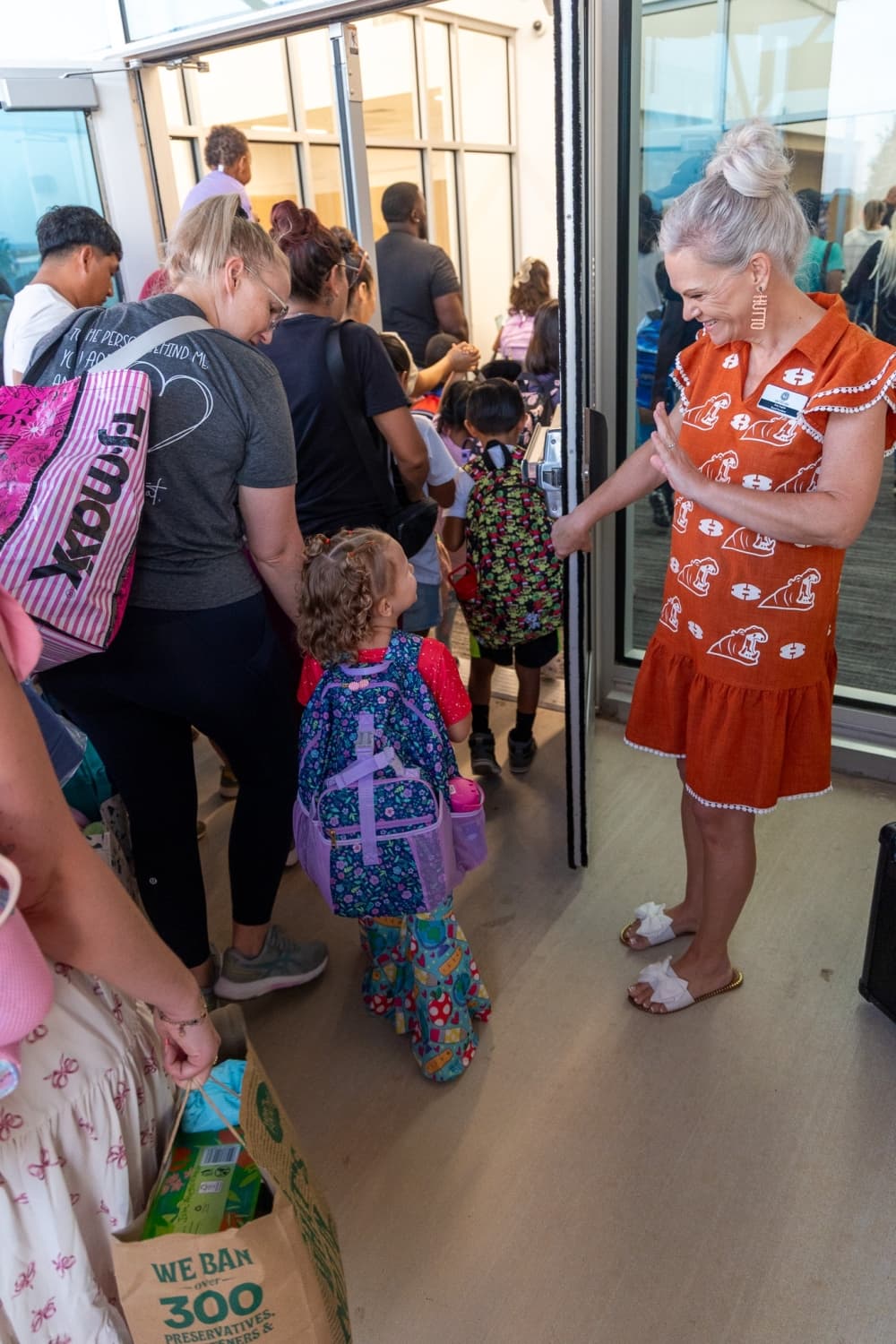Hutto ISD Board President Amy English welcomes students and their families on the first day of school. (Courtesy Hutto ISD)