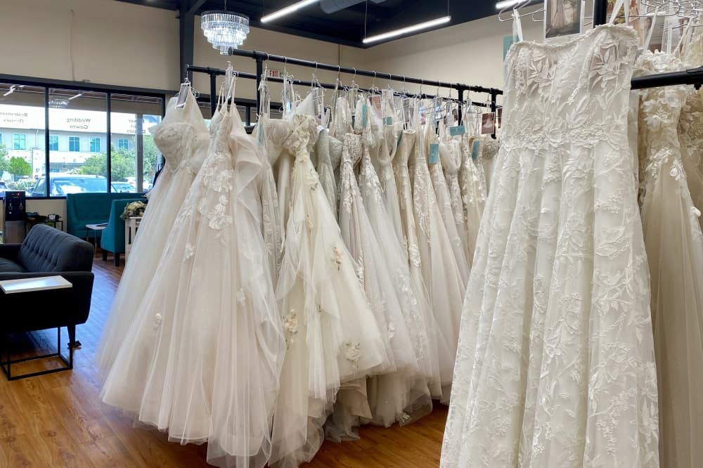 Amour Bridal staff travels to bridal markets twice a year to preview inventory and hand-select new dresses to bring into the store. (Katlynn Fox/Community Impact)
